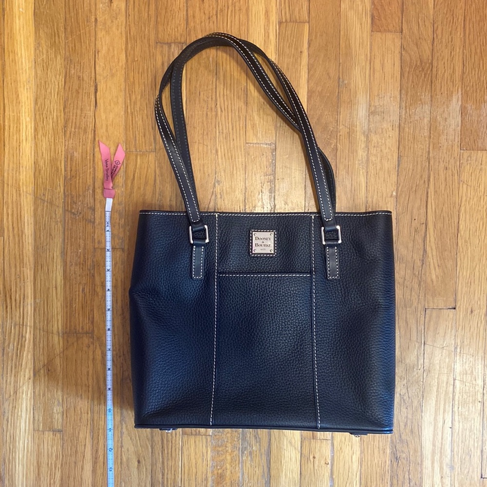 “As is” used black Dooney and Bourke shoulder bag.